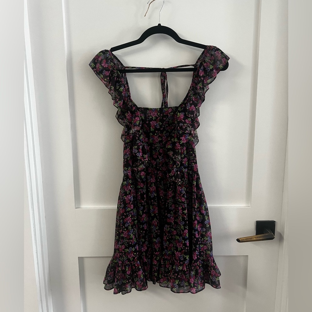 Ruffle detail black ground floral mini dress